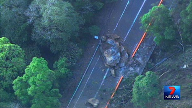A boulder has fallen onto the Cunningham Highway, blocking traffic.