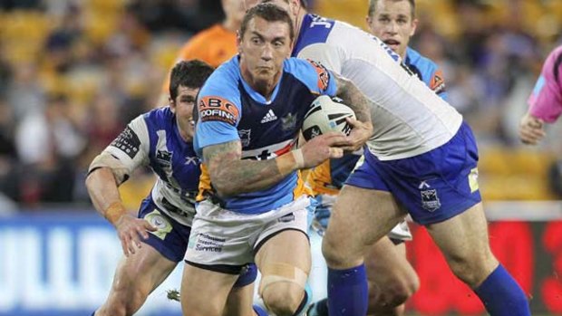 Mat Rogers will play out the NRL season with the Gold Coast Titans before retiring from both rugby codes.