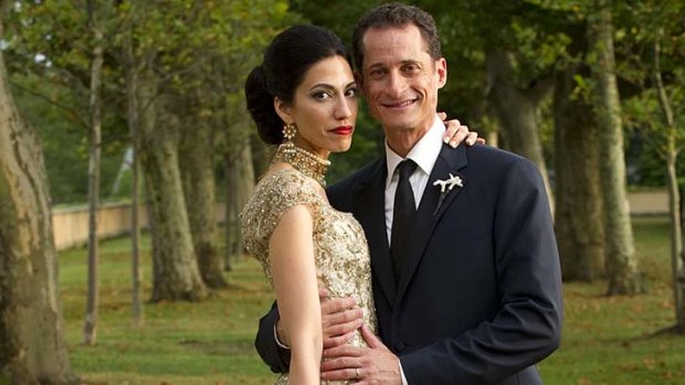 Happier times ... Anthony Weiner and his wife Huma Abedin at their wedding.