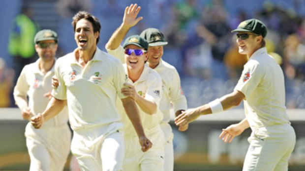 Off to a flyer: Mitchell Johnson after his delivery to dismiss Misbah-ul-Haq