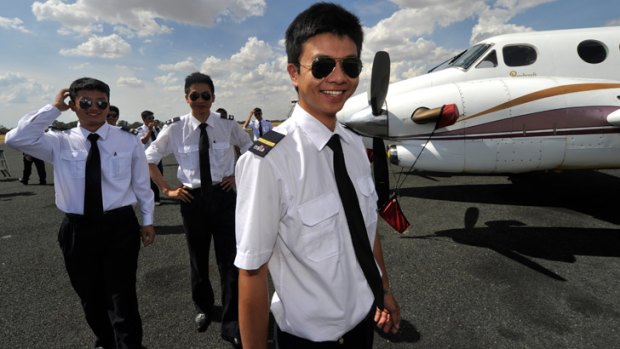 All smiles: The pilots are instructed by Moorabbin Flight Training Academy.