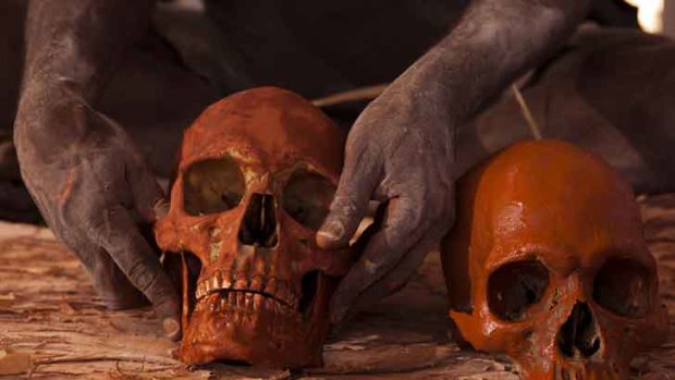 A photograph from Glenn Campbell's award-winning essay of Arnhem Land elders reburying ancestral bones, which had been held by the Smithsonian Institution in the US for 60 years.