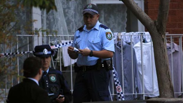 Police seal off an apartment in Glebe after a man was shot dead.