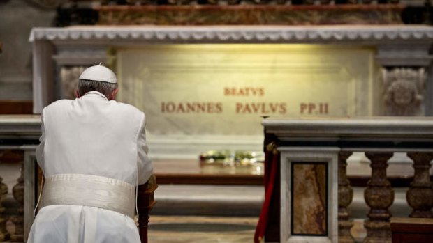 Pope Francis prays at the tomb of Pope John Paul II on the anniversary of his death.