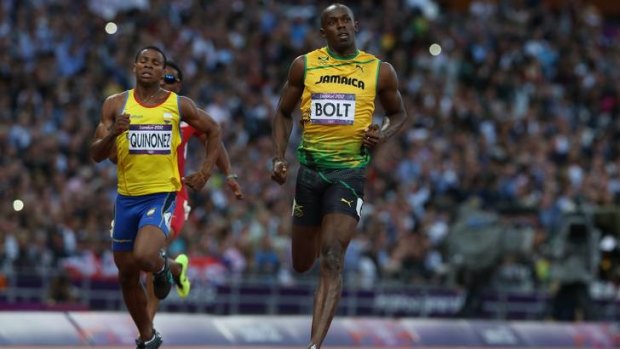 Conserving energy .. Usain Bolt wins his semi-final.