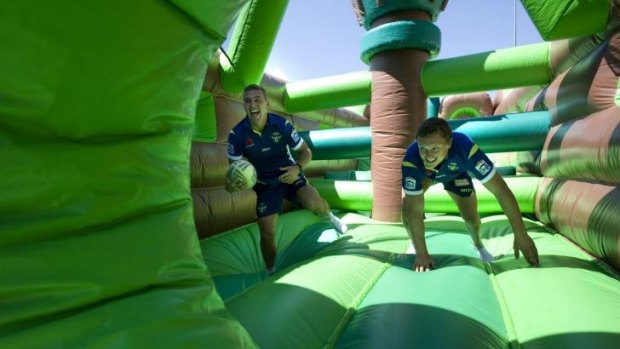Jack Wighton and Mitch Cornish acting like children on a jumping castle during pre-season. Now they're expecting their own. 