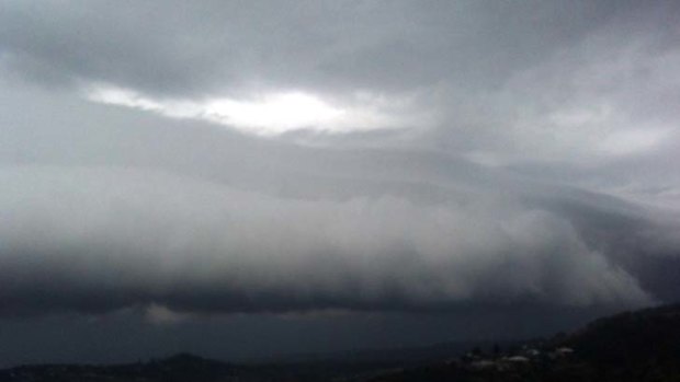 The storm front moves across Sydney's Bilgola yesterday.
