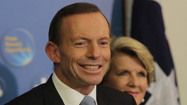 Tony Abbott makes a statement with Julie Bishop following the ALP leadership spill.