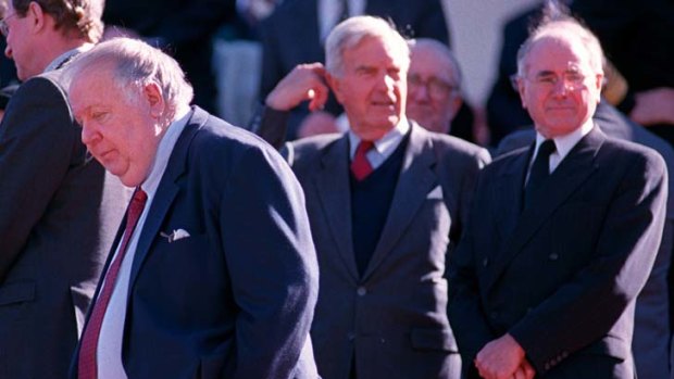 Tainted defector ... Mal Colston, left, in 1999 and the then prime minister, John Howard, right.