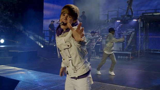 Gimme all your lovin': Justin Bieber gives his all to his shrieking fans in the pseudo-doc Never Say Never.