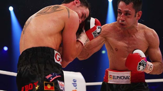 Daniel Geale, with the Aboriginal flag on his shorts, fighting Felix Sturm of Germany in Oberhausen last month.