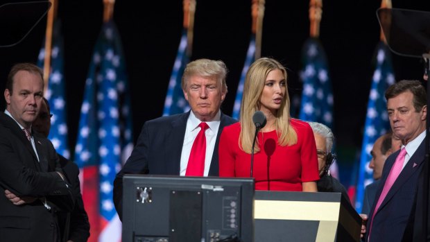 Then-Trump campaign manager Paul Manafort, right, watches with then-Republican presidential candidate Donald Trump and Manafort's chief deputy Rick Gates, left, as Ivanka Trump rehearses for the Republican National Convention in Cleveland in 2016.