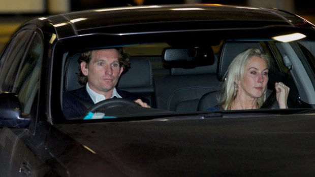 James Hird and wife Tania leave AFL House on Tuesday.