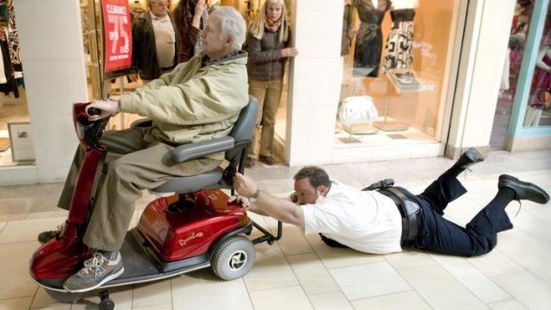 Bernie McInerney as Old Man and Kevin James as Paul Blart in <i>Paul Blart: Mall Cop 2</i>.