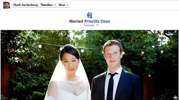 Facebook co-founder and CEO Mark Zuckerberg and Priscilla Chan are seen in this screengrab of a wedding photo posted on Zuckerberg's Facebook page.