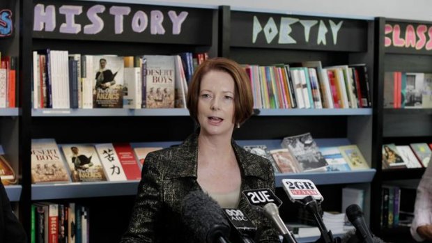 Prime Minister Julia Gillard at a book store to announce a tax cut for small business as the government holds off a joint attack from the Greens and the Coalition about proposed tax cuts.