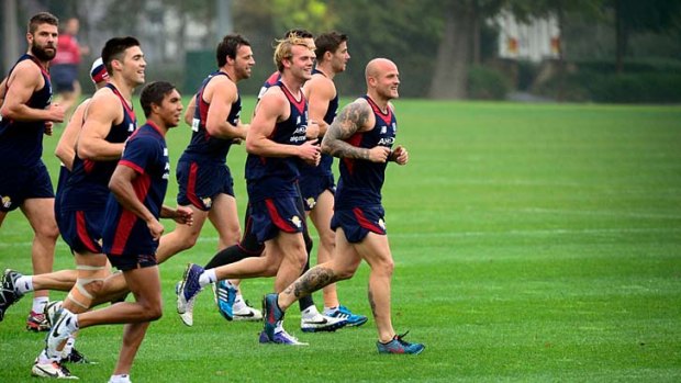 Demons players train on Tuesday.
