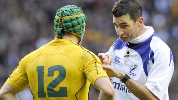 Craig Joubert prepares to sin bin Matt Giteau after a cynical professional foul in the 36th minute.