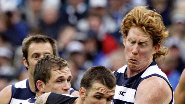 Geelong skipper Cameron Ling has Magpie Dane Swan almost wrapped up.