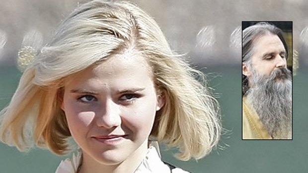 Telling her story ... Elizabeth Smart talks about being chained to a tree, drugged and raped almost daily by the man charged with abducting her, Brian David Mitchell, when she was 14. Photos: AFP, AP