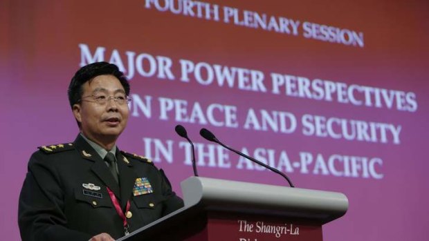 Provocative challenge: Deputy chief of staff of the Chinese Army Lieutenant-General Wang Guanzhong speaks at the Shangri-La Dialogue, in Singapore.
