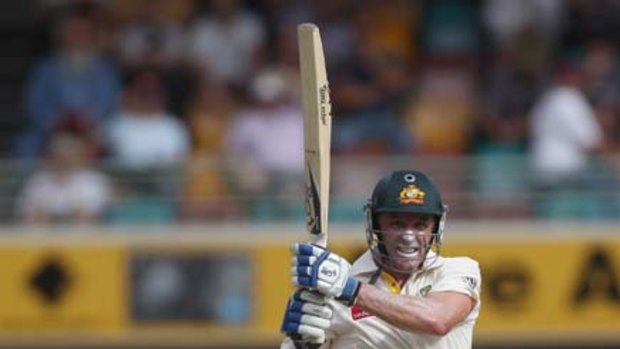 Hitting out ... Mike Hussey silenced his many critics with his fighting knock against England yesterday at the Gabba.