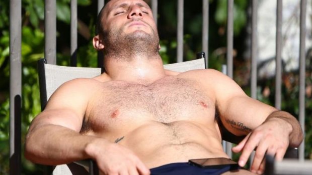 Takin’ it easy: Robbie Farah relaxes at the Blues camp in Coffs Harbour.