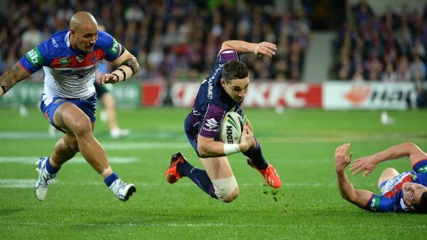Floored: Billy Slater is brought down.