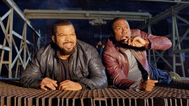 Duck for cover: Ice Cube (left) plays alongside Kevin Hart in the new film <i>Ride Along</i>.