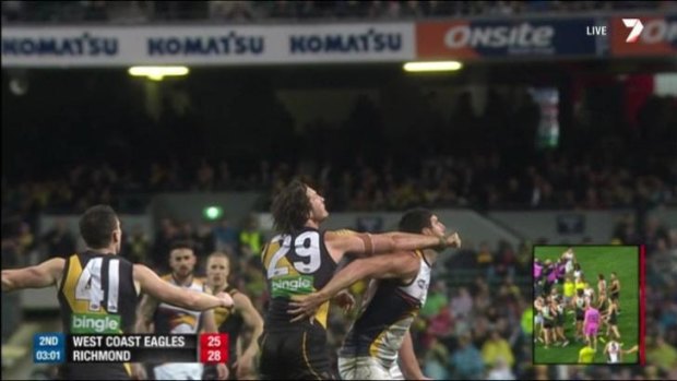 Ty Vickery collects Dean Cox.