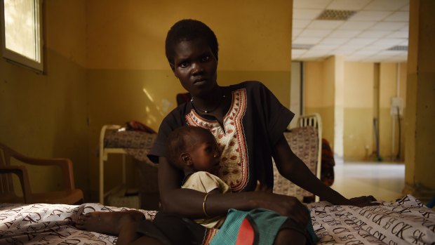 Nyereka Maliyah, 20, with her one-year-old baby Dictor Geng. Dictor is being treated at the CARE stabilisation point at Bentiu Hospital in South Sudan. 