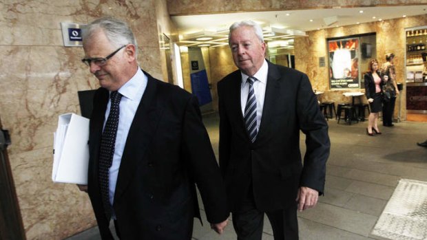 John McGuigan, right, arrives to give evidence at the Obeid ICAC inquiry.