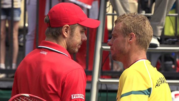 Anti-climax ... Switzerland's Stanislas Wawrinka shakes hands with Australia's Lleyton Hewitt.