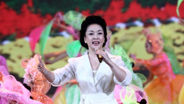 Singing her way into people's hearts &#8230; Peng Liyuan is a much admired public figure in China; she is an entertainer, a philanthropist and the wife of the current vice-president.