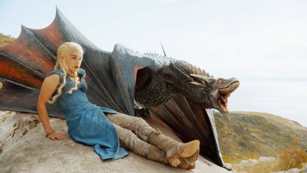 Daenerys Targaryen and one of her three dragons in <i>Game of Thrones</i> season four.