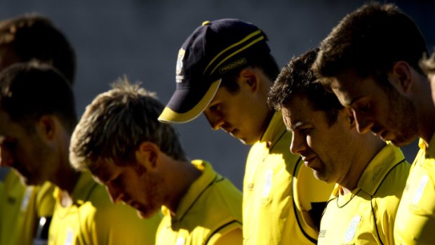 Hampshire players wear black armbands and observe a minute's silence in memory of Tom Maynard.