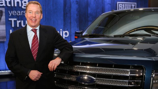 Ford global executive chairman Bill Ford poses next to an F150 truck, the company's most profitable vehicle.
