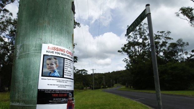 A poster on a telegraph pole at the start of Benaroon Drive, Kendall asking for information about missing toddler William Tyrrell.
