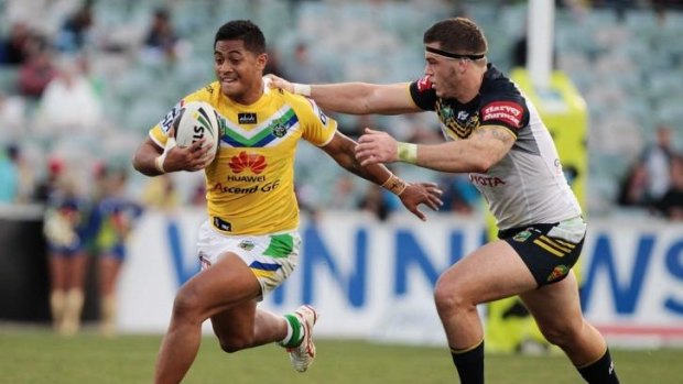 Canberra fullback Anthony Milford on the run against North Queensland.