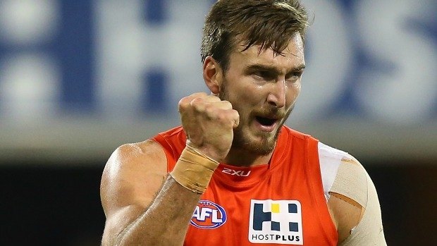 GOLD COAST, AUSTRALIA - JULY 05:  Charlie Dixon of the Suns celebrates a goal during the round 16 AFL match between the Gold Coast Suns and the Collingwood Magpies at Metricon Stadium on July 5, 2014 in Gold Coast, Australia.  (Photo by Chris Hyde/Getty Images)