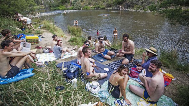 Locals beware: crowds are flocking to waterholes such as Laughing Waters to keep cool.