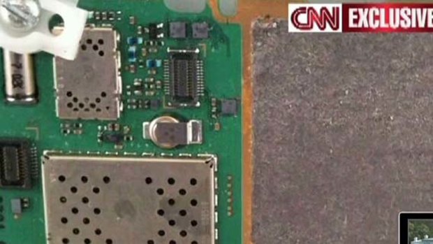 This video still obtained from the (CNN) allegedly show the circuit board attached to an ink toner cartridge found in a package aboard a UPS cargo plane.