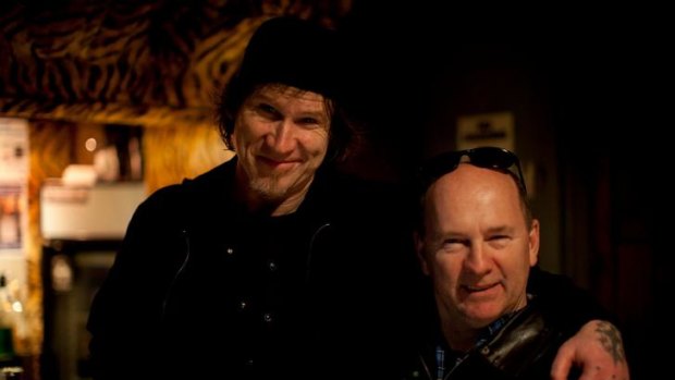 Bill Walsh, with Mark Lanegan (left), is now the sole owner of the Ding Dong Lounge.