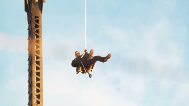 Flying Fox ... Michael Fox abseils off the Harbour Bridge, grinding Sydney transport to a halt.