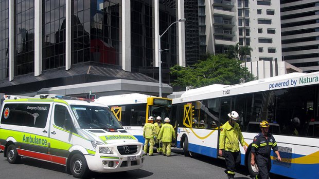 Emergency crews attend a CBD bus crash.
