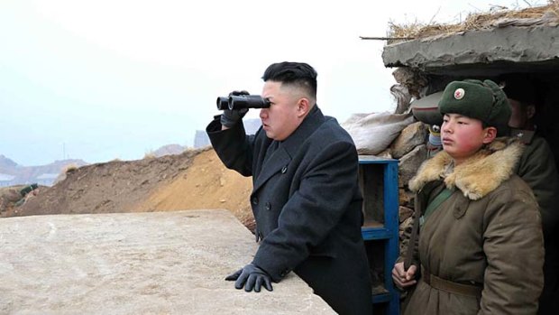 Armistice insufficient for maintaining peaceful relations: Kim Jong-un looks out to South Korea from an observation post on Jangjae islet.