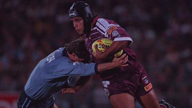 Origin great: Steve Renouf is tackled by Andrew Ettingshausen in May 1998.