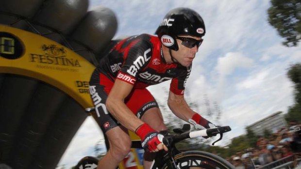 On the cusp of greatness ... Cadel Evans begins the 42.5km time trial that seals his fate in Tour de France history.