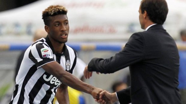 Mature performance: Juventus striker  Kingsley Coman shakes hands with his coach Massimiliano Allegri.