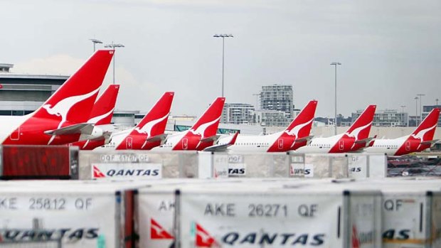 Turbulent times: 'Persistent pressures have eroded Qantas' market share', an S&P analyst says.